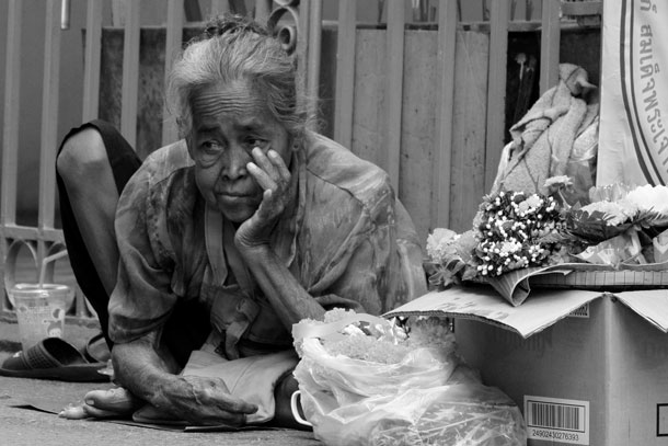 Beggar (yep, paid her lunch) | Nikon V2, Nikkor 30-110mm