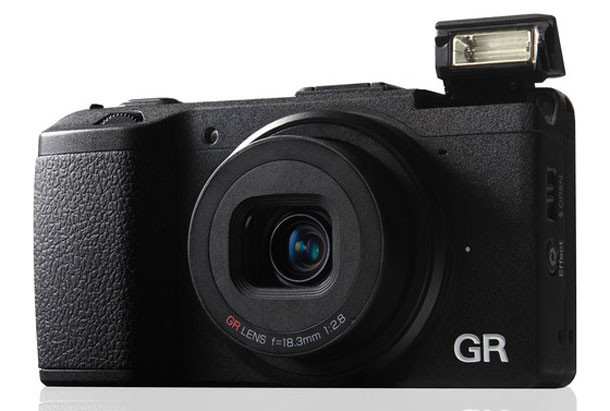Ricoh GR -- small, light, relatively cheap and promising performance, what more you want?